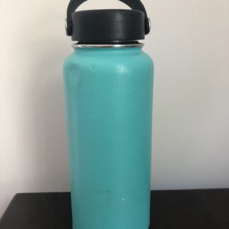 A wide-mouth bottle in sea green with a loop lid