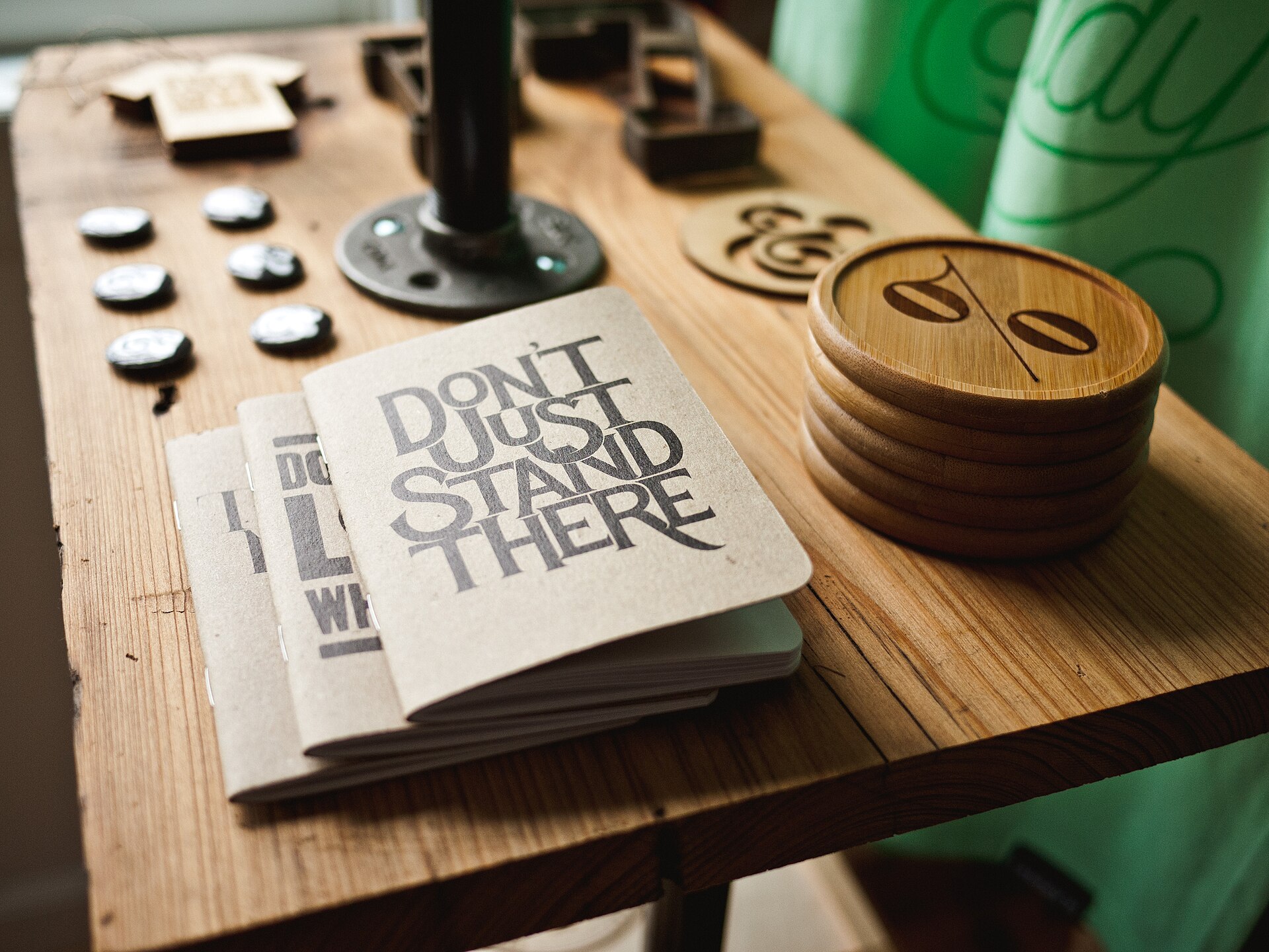 Kraft-cover pocket notebooks on a workbench